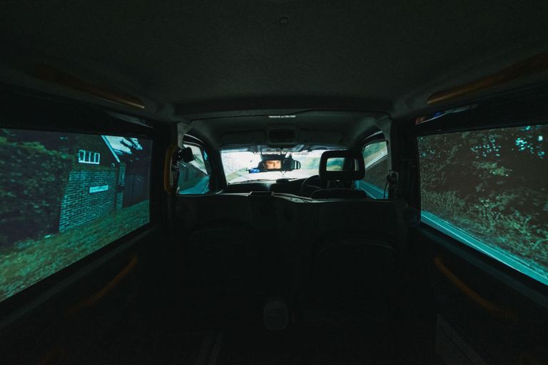 A still from the film Driving Home from the back of a black cab